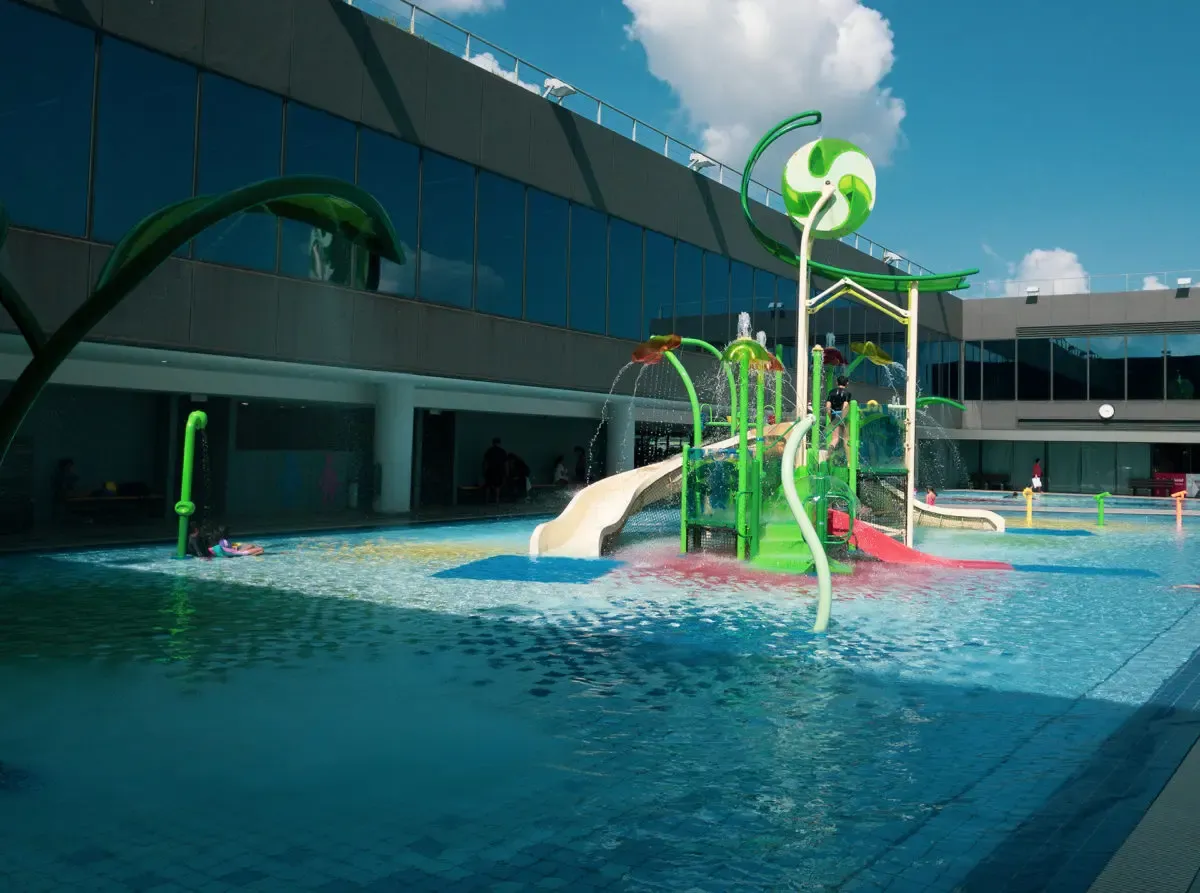 Kids interactive water play pool with slides and splash features at Heartbeat@Bedok
